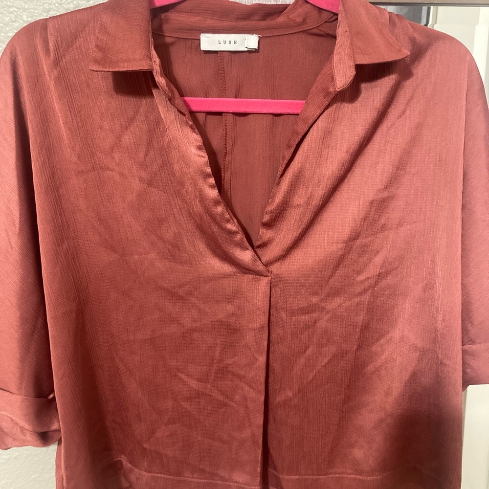 LUSH brand cropped collared shirt.